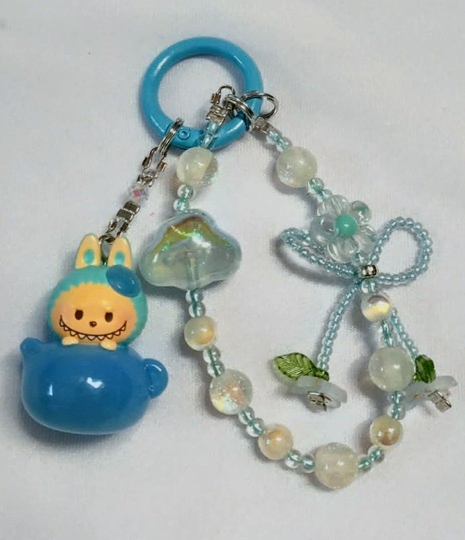blue labubu authentic popmart popbeans DIY charms (Category: Charms) located in Caloocan City. Submitted by jark_moonshop (Listing ID 1464276334, Image 1). Description: authentic popmart popbeans DIY charms with marking. gift pouch and transparent blank tag is available with extra fee of 10pesos per set of pouch and blank tag for tag price can do lalamove or JNT .