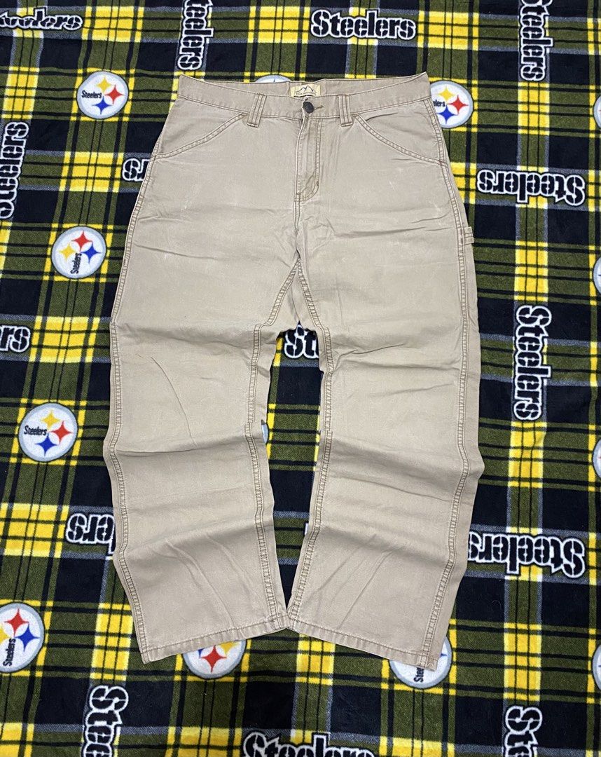 BLUE MOUNTAIN,Khaki carpenter pants (Category: Jeans) located in Cavite. Submitted by jc_thrift95 (Listing ID 1464216606, Image 1). Description: - a beige or khaki carpenter pants featuring a classic multi-pocket utility design and durable stitched seams. - Made in Bangladesh - Color rate 8/10 - See pictures details for dimes. - L- 39.5 inch - W- 17 inch .