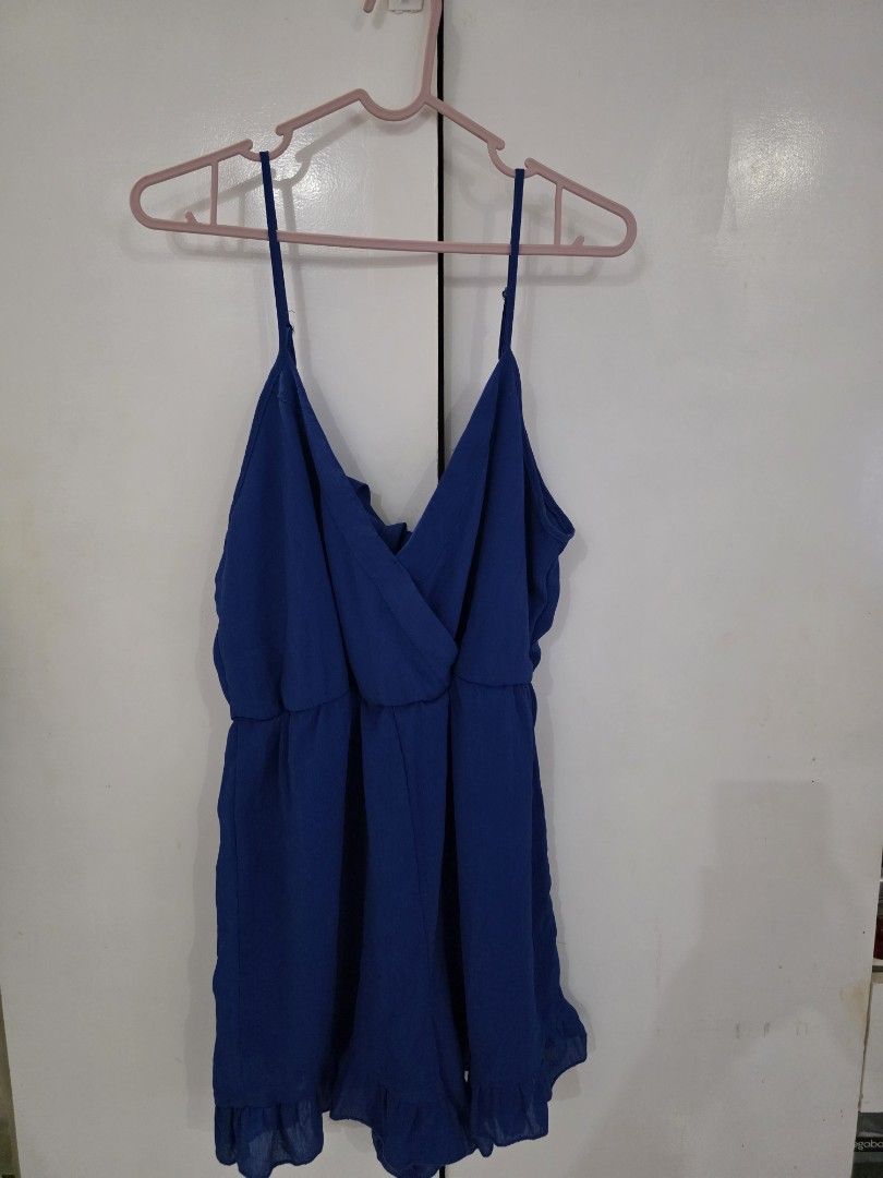 Blue Spaghetti Strap Mini Dress (Category: Rompers) located in Puerto Princesa. Submitted by kholene (Listing ID 1464323526, Image 1). Description: - Adorable blue mini romper - Features delicate spaghetti straps - Flattering V-neckline - Flowy, lightweight material - Chic ruffled hem detail - Versatile for casual days or evening events - Effortlessly style with your favorite accessories.