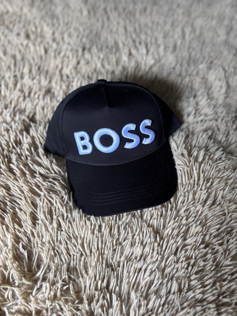 BOSS Cap Black (Category: Caps & Hats) located in Quezon City. Submitted by nojthrift (Listing ID 1464250587, Image 1). Description: - Black BOSS cap - Light blue embroidered BOSS logo on front - Adjustable strap at the back - Ideal for everyday wear - Simple and stylish design 850+ship only.
