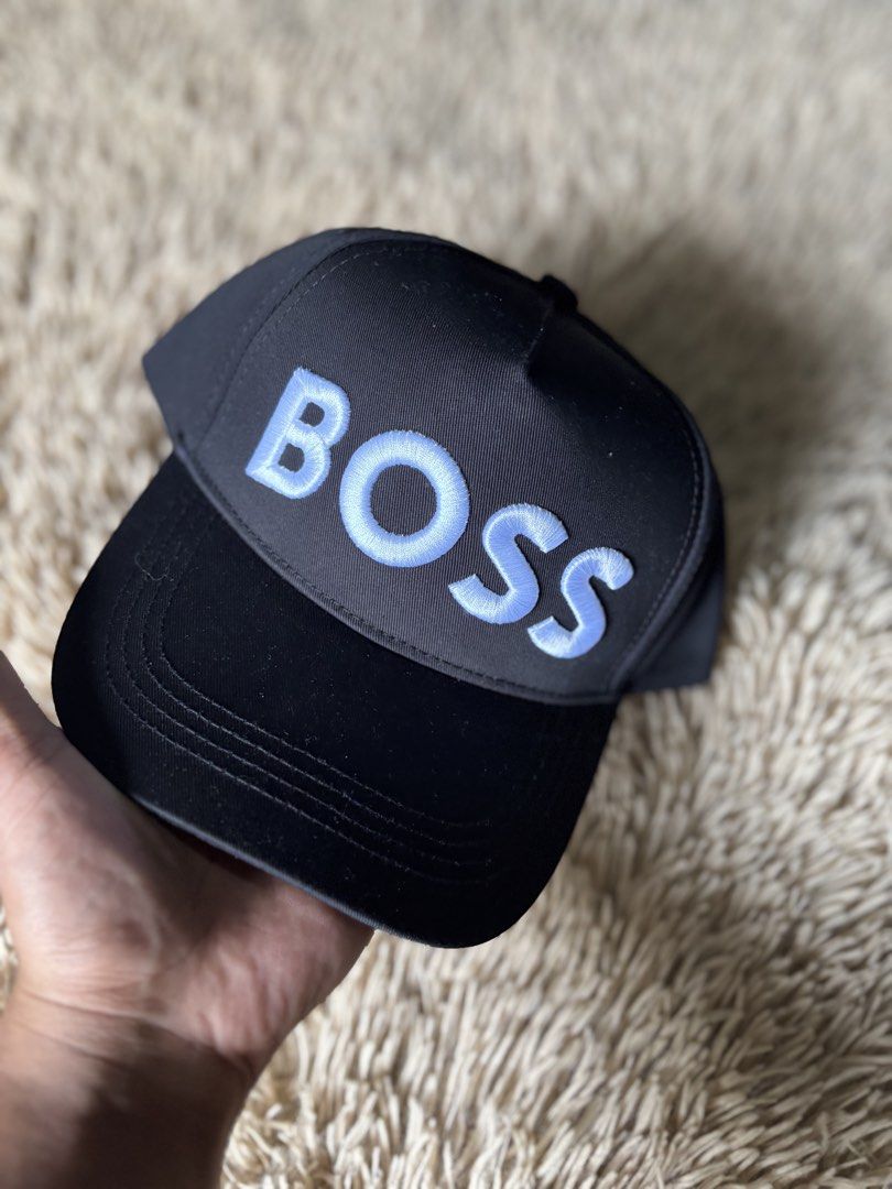 BOSS Cap Black (Category: Caps & Hats) located in Quezon City. Submitted by nojthrift (Listing ID 1464250587, Image 2). Description: - Black BOSS cap - Light blue embroidered BOSS logo on front - Adjustable strap at the back - Ideal for everyday wear - Simple and stylish design 850+ship only.