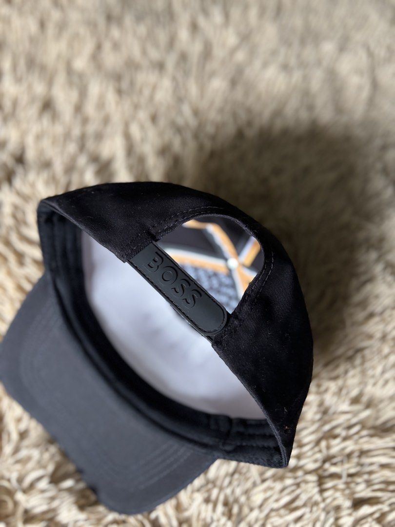 BOSS Cap Black (Category: Caps & Hats) located in Quezon City. Submitted by nojthrift (Listing ID 1464250587, Image 3). Description: - Black BOSS cap - Light blue embroidered BOSS logo on front - Adjustable strap at the back - Ideal for everyday wear - Simple and stylish design 850+ship only.