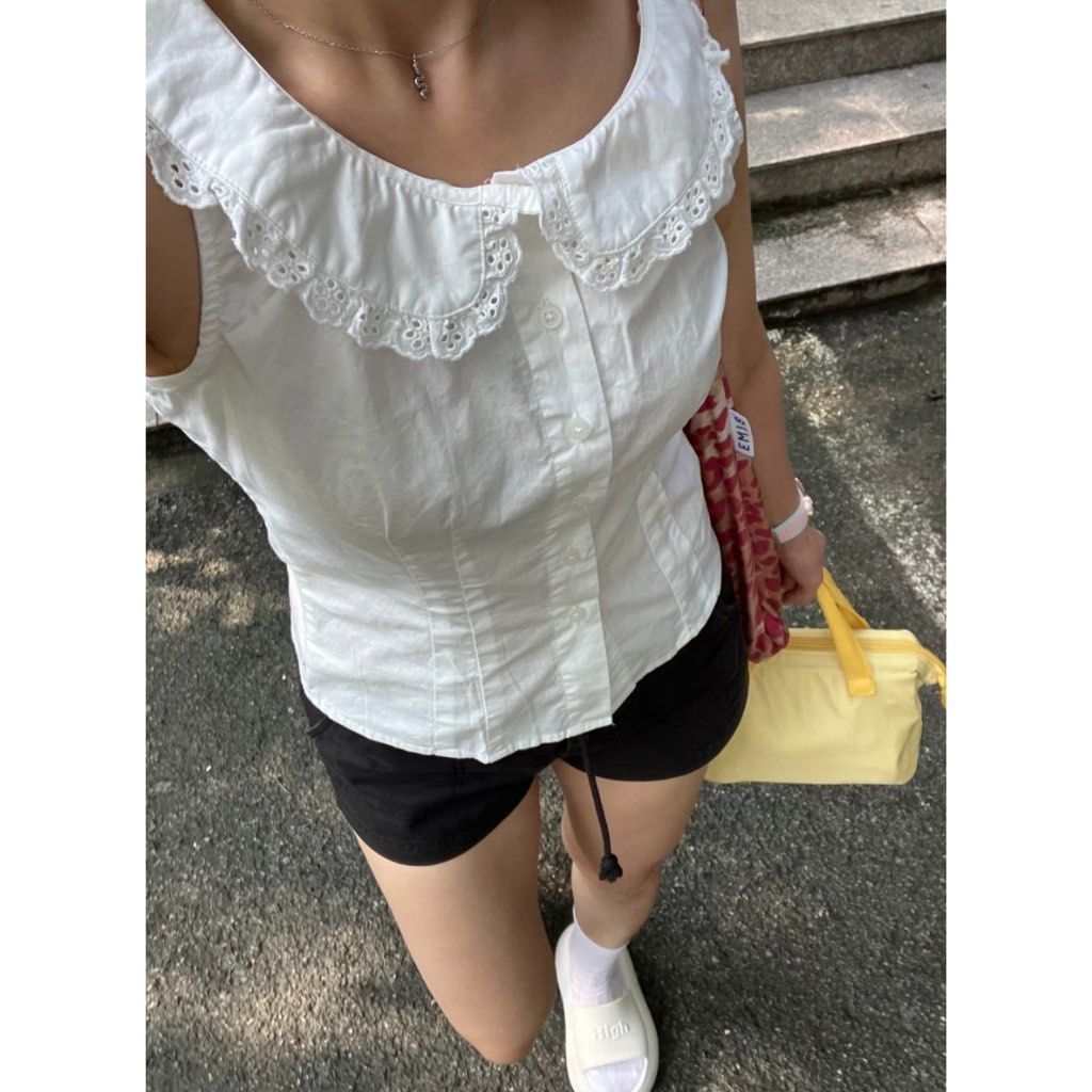 Brandy Melville Matilda Top (Category: Sleeveless) located in Cavite. Submitted by yema.cake (Listing ID 1464323928, Image 2). Description: RFS: decluttering MOP: gcash MOD: j&t strictly no returns/refund policy 🏷️ - motel rocks - uniqlo - hollister - princess polly - bershka - zara - cotton on - h&m / hnm - soft girl White Sleeveless Button Up Top with Lace Peter Pan Collar.