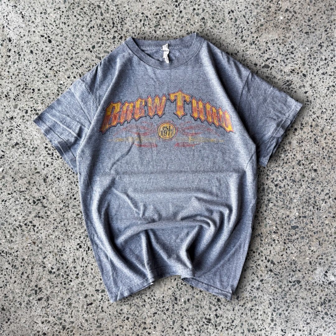 BREW THRU (Category: Tshirts & Polo Shirts ) located in Quezon City. Submitted by theq.thriftshop (Listing ID 1464145572, Image 1). Description: PLEASE READ FIRST! MINE ₱349 + sf (FIXED) Size M (L 26”, W 19.5”) Color may vary due to lighting Model’s height: 5’9 💸 G-Cash payment 📦 J&T Nationwide shipping.