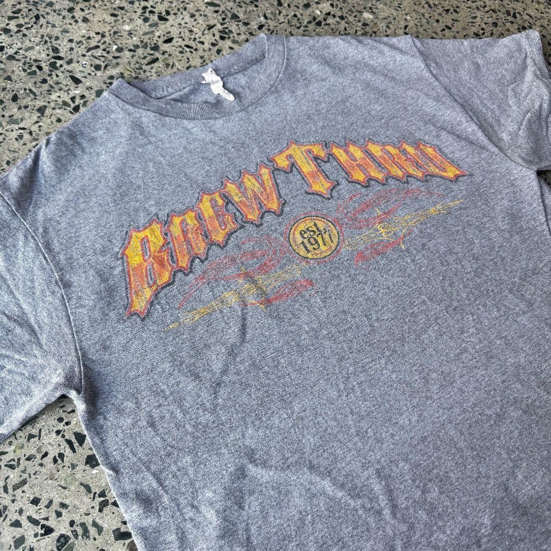 BREW THRU (Category: Tshirts & Polo Shirts ) located in Quezon City. Submitted by theq.thriftshop (Listing ID 1464145572, Image 3). Description: PLEASE READ FIRST! MINE ₱349 + sf (FIXED) Size M (L 26”, W 19.5”) Color may vary due to lighting Model’s height: 5’9 💸 G-Cash payment 📦 J&T Nationwide shipping.