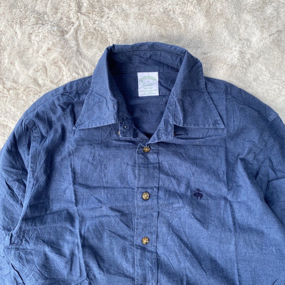 BROOKS BROTHERS BUTTON DOWN LONG SLEEVE POLO AUTHENTIC (Category: Coats, Jackets and Outerwear) located in Cadiz. Submitted by thrift_hunt_garage (Listing ID 1464275858, Image 2). Description: BROOKS BROTHERS BUTTON DOWN LONG SLEEVE POLO AUTHENTIC Size and measurements by inches : On tag Small Width 20 Length 27 Sleeve 25 Condition and details : Cotton material Chest embroided logo Issue none Flaws none.