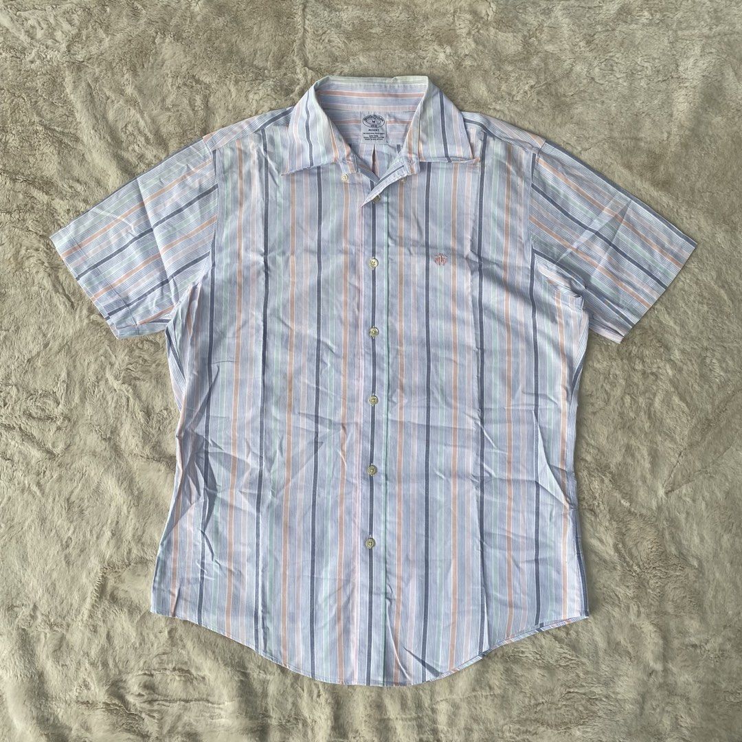 BROOKS BROTHERS BUTTON DOWN SHORT SLEEVE POLO AUTHENTIC (Category: Activewear) located in Cadiz. Submitted by thrift_hunt_garage (Listing ID 1464276628, Image 1). Description: BROOKS BROTHERS BUTTON DOWN SHORT SLEEVE POLO AUTHENTIC Size and measurements by inches : On tag Medium Width 22 Length 28 Conditions and details : Supima cotton material Vertical stripe design Issue none Flaws need wash .