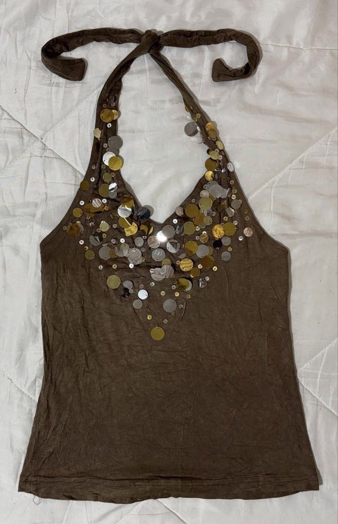 Brown Halter Top with Sequins (Category: Sleeveless) located in Caloocan City. Submitted by mmc1999 (Listing ID 1464293667, Image 1). Description: - Brown halter top - Sparkly sequin detail around the neckline - Ties at the neck for adjustable fit - Gathered elastic waistband at the back - Ideal for a night out or casual party.