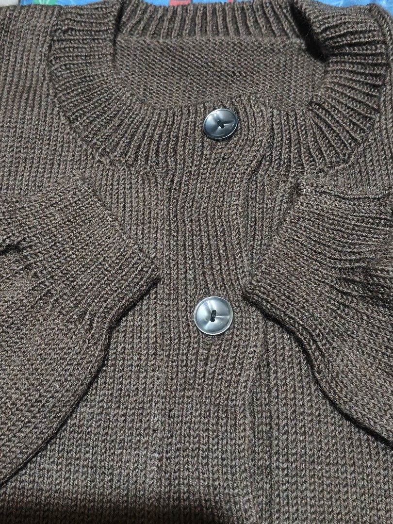 Brown Knit Button Up (Category: Coats, Jackets and Outerwear) located in Baguio. Submitted by oberdosed (Listing ID 1464348384, Image 2). Description: Brown Knit with Buttons A charming, textured knit that blends warmth with vintage appeal. Measurements: Length: 25" | Width: 18.5" | Sleeves: 18".