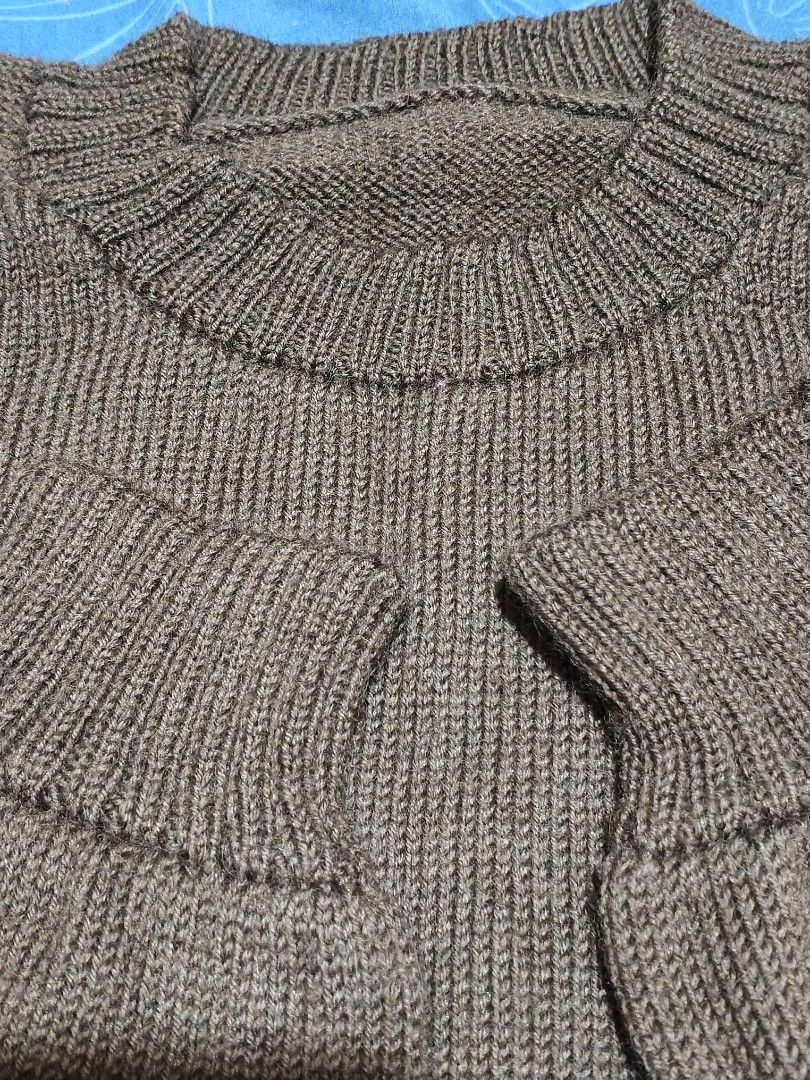 Brown Knitted Sweater (Category: Coats, Jackets and Outerwear) located in Baguio. Submitted by oberdosed (Listing ID 1464348255, Image 2). Description: Brown Knitted Sweater A soft, essential brown knit designed for effortless layering. Measurements: Length: 25" | Width: 19" | Sleeves: 18".
