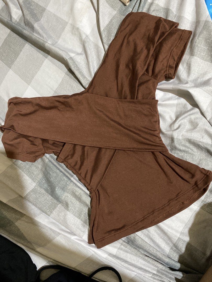 Brown off-shoulder ruched crop top (Category: Blouses) located in San Fernando. Submitted by kimaijoo (Listing ID 1464155547, Image 1). Description: - Cute brown crop top - Off-shoulder design - Ruched detailing - Stretchy material - Fits size Small to Medium (approx.) - Perfect for summer or going out.