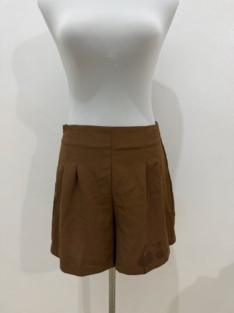 Brown Pleated High-Waisted Shorts (Category: Shorts) located in Manila. Submitted by e.louise (Listing ID 1464334202, Image 2). Description: - High-waisted brown shorts - Front pleats for a stylish look - Convenient side zipper closure - Ideal for everyday casual wear.