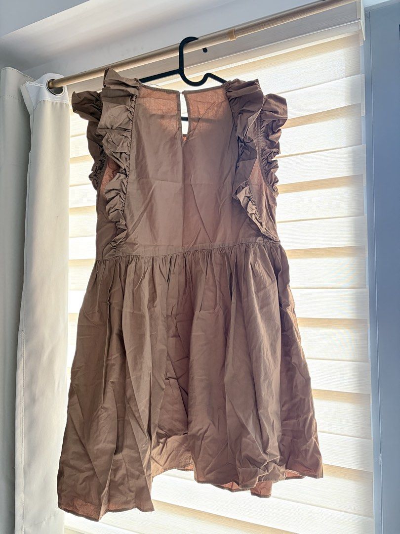 Brown Ruffled Cap Sleeve A-Line Dress (Category: Dresses) located in Manila. Submitted by cheska.closet18 (Listing ID 1464178264, Image 2). Description: - Cute brown dress - Ruffled cap sleeves - Gathered waist - Flowy A-line skirt - Sleeveless design with cap sleeves - Small keyhole opening at the back - Ideal for casual outings or a day out.