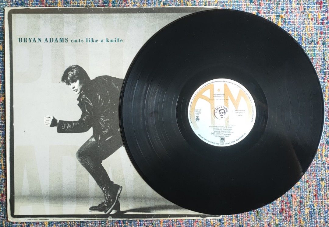Bryan Adams - Cuts Like A Knife LP Vinyl Record (Category: Vinyls) located in Quezon City. Submitted by plaka.o.plomo (Listing ID 1464237115, Image 3). Description: Artist(s) : Bryan Adams Album : Cuts Like A Knife Year : 1983 Media : VG+ Color : Black Sleeve : VG+ No. : 1x Vinyl Size : 12" RPM : 33 Country : Yugoslavia Catalog No. : 2420120 Tracklist : - Side A 1. The Only One 2. Take Me Back 3. This Time 4. Straight From The Heart 5. Cuts Like 