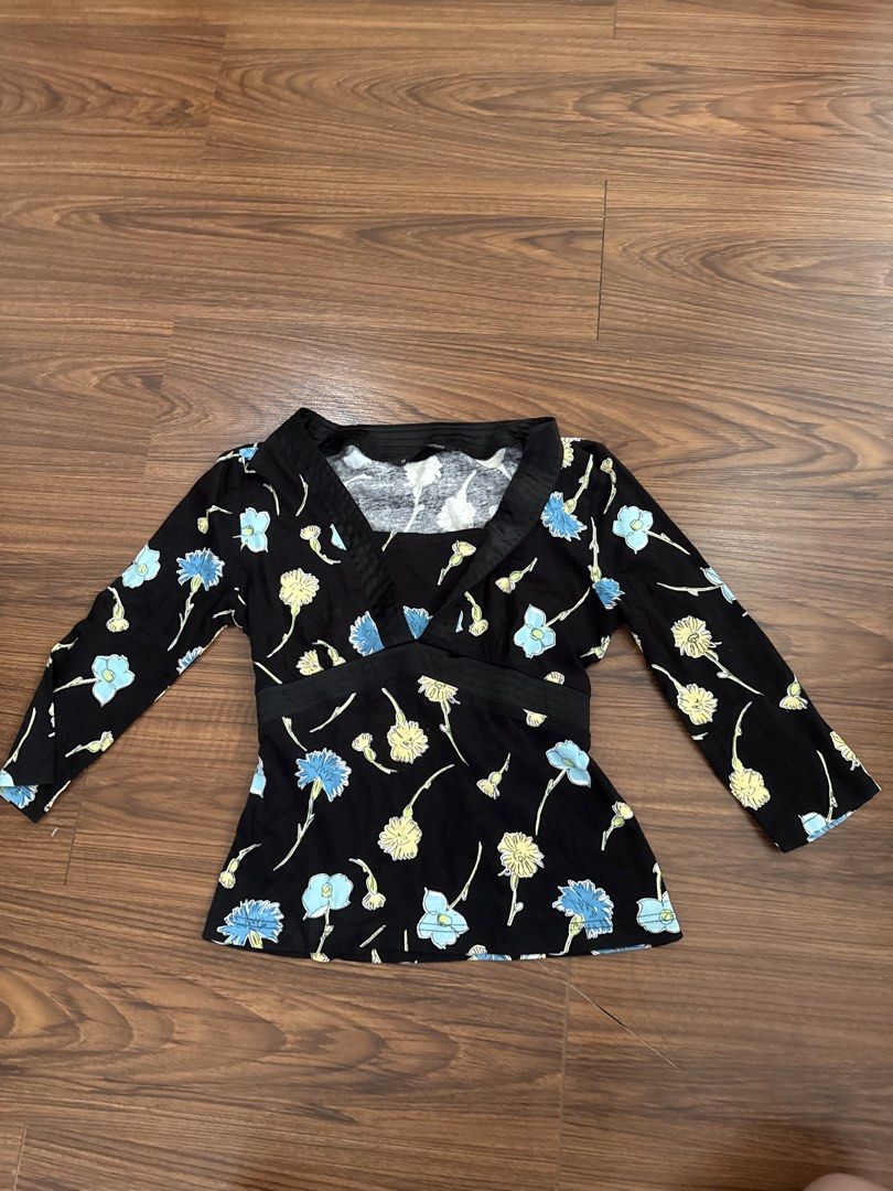 Bundle casual Tops (Category: Blouses) located in Rizal. Submitted by thrifty.mom (Listing ID 1464279578, Image 3). Description: - Bundle of 3 tops in Size M - Black floral print top from Zucozz with 3/4 sleeves - White top with sheer ruffled neckline and short sleeves - Solid burgundy top with twisted front detail and short sleeves - Perfect mix for your wardrobe essentials.