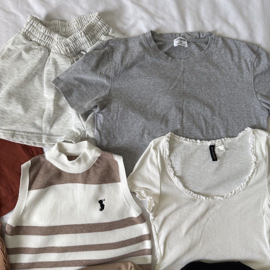 Bundle of Tops and Shorts - Various Styles (Category: Sets or Coordinates) located in Las Pinas. Submitted by purplearmy16 (Listing ID 1464192005, Image 1). Description: - Bundle includes 9 pieces: tops and shorts. - Rust-colored shorts - Light grey shorts - White ribbed tank top - Grey t-shirt - White top with ruffled neckline - Striped knit vest - Black collared top with heart buttons - Beige collared knit top - Black collared knit top - Ideal 