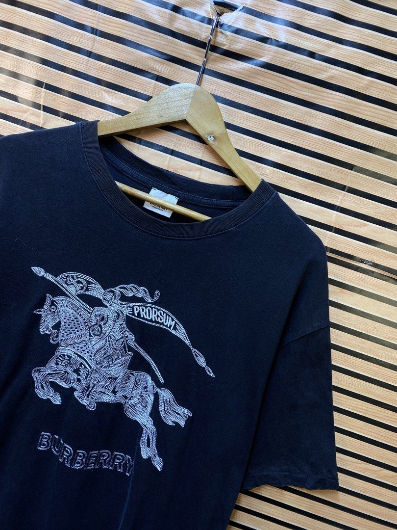 BURBERRY “BIG EMBROID LOGO” TEE (Category: Tshirts & Polo Shirts ) located in Makati City. Submitted by drip.poww (Listing ID 1464234257, Image 2). Description: - Authentic Burberry - Color: Black - Size: Large - Dimes: 23x27 - Authentic - Excellent condition - Need wash, fresh from bale - Material: 100% Cotton Please don’t expect too much—these are thrifted (ukay) items. 😊 !!STILL NEGOTIABLE!!.