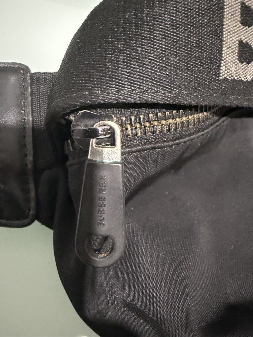Burberry Black Nylon Belt Bag with Logo Strap (Category: Luxury Bags & Wallets) located in Manila. Submitted by youngforest.c07079 (Listing ID 1464331949, Image 3). Description: Selling a pre-loved original Burberry black nylon belt / cross-body bag with the bold Burberry logo and engraved buckle hardware. Brand: Burberry (Original) Material: Durable Nylon with metal/matte hardware Condition: Pre-loved / Good condition Price: ₱1,100 Delivery: Buy