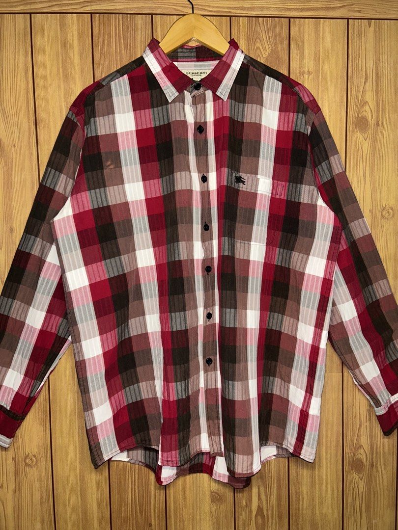 Burberry Longsleeve Check Button Down Shirt (Category: Tshirts & Polo Shirts ) located in Manila. Submitted by zerowasteco. (Listing ID 1464322947, Image 1). Description: -Excellent Condition -Dimes:L30xW24 Dm for more info!.