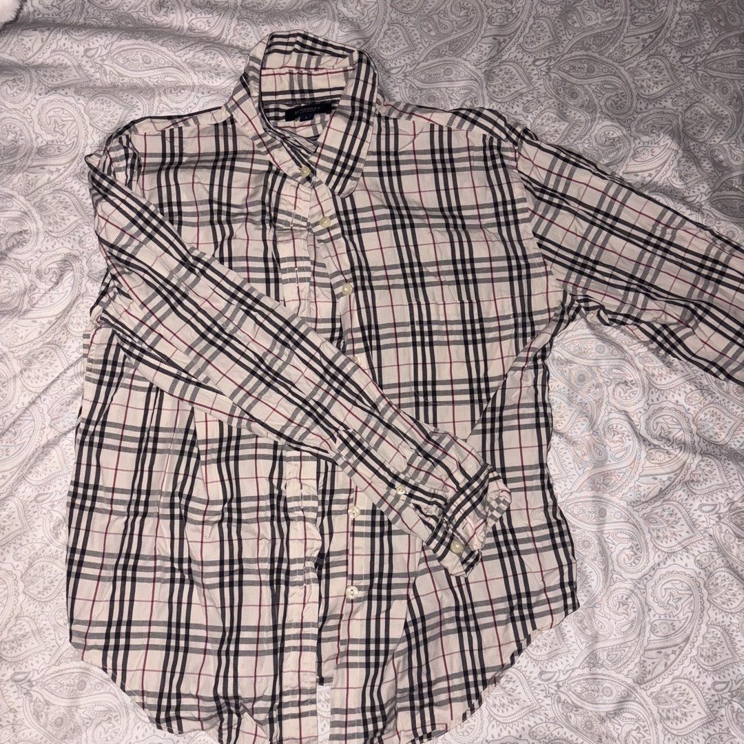 Burberry Longsleeves button-up polo (Category: Longsleeves) located in Cavite. Submitted by yminhq (Listing ID 1464312015, Image 1). Description: .