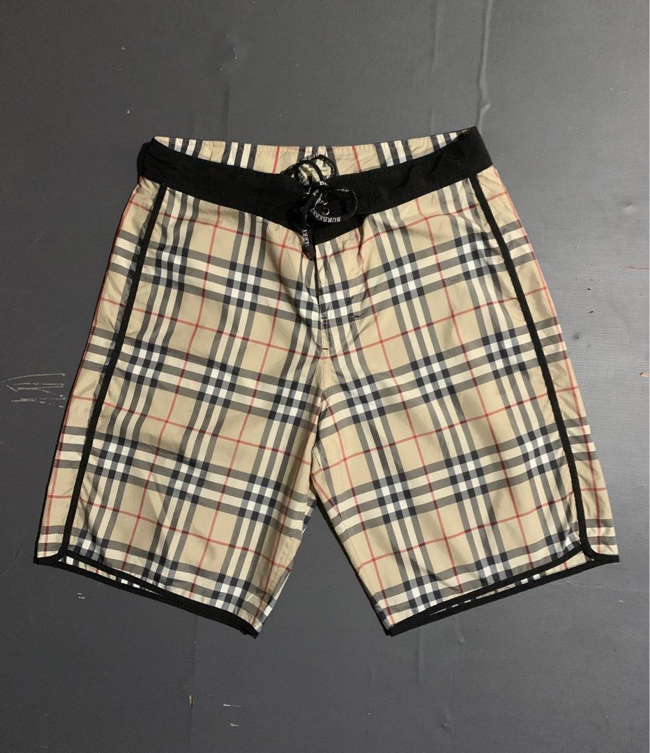Burberry Nova Check Swim Shorts (Category: Swim Trunks & Board Shorts) located in Dumaguete. Submitted by grrrpowww (Listing ID 1464183340, Image 1). Description: - Classic Burberry nova check pattern all over - Comfortable elastic waistband with drawstring - Two side pockets and one back pocket - Made from 100% polyester - Ideal for beach or pool wear.