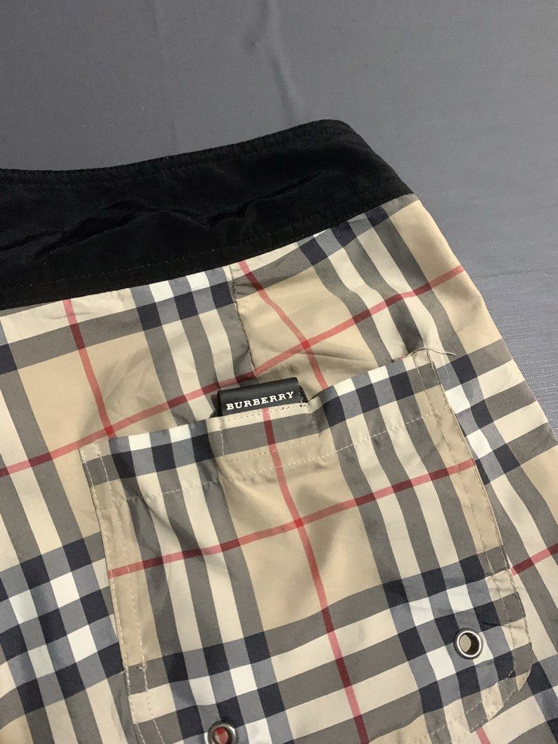 Burberry Nova Check Swim Shorts (Category: Swim Trunks & Board Shorts) located in Dumaguete. Submitted by grrrpowww (Listing ID 1464183340, Image 3). Description: - Classic Burberry nova check pattern all over - Comfortable elastic waistband with drawstring - Two side pockets and one back pocket - Made from 100% polyester - Ideal for beach or pool wear.