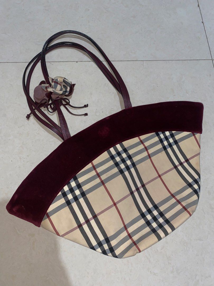 Burberry Nova Check Velvet Tote Bag (Category: Tote Bags) located in Taguig. Submitted by _lly.wyn (Listing ID 1464198683, Image 2). Description: - Classic Burberry tote bag - Iconic Nova Check pattern - Deep burgundy velvet trim - Interior zip pocket - Signature Burberry lining - Comes with dust bag - Ideal for everyday use or weekend getaways.