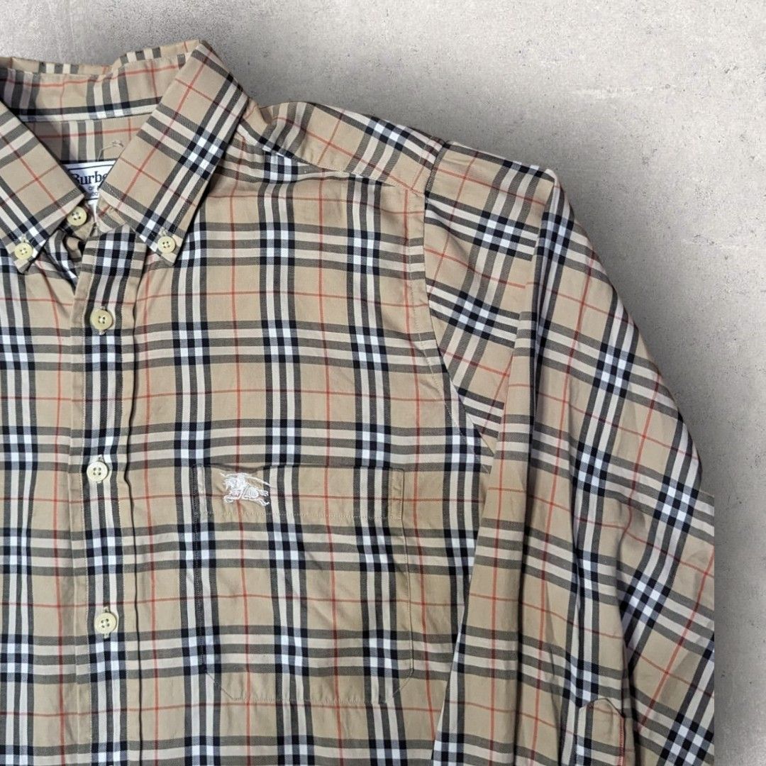 Burberry Plaid Long sleeve Polo (Category: Luxury Apparel) located in San Juan City. Submitted by 4keeps.mnl (Listing ID 1464279630, Image 2). Description: AUTHENTIC ✅ ORIGINAL Condition: 9.8/10 Large Issue: NONE.