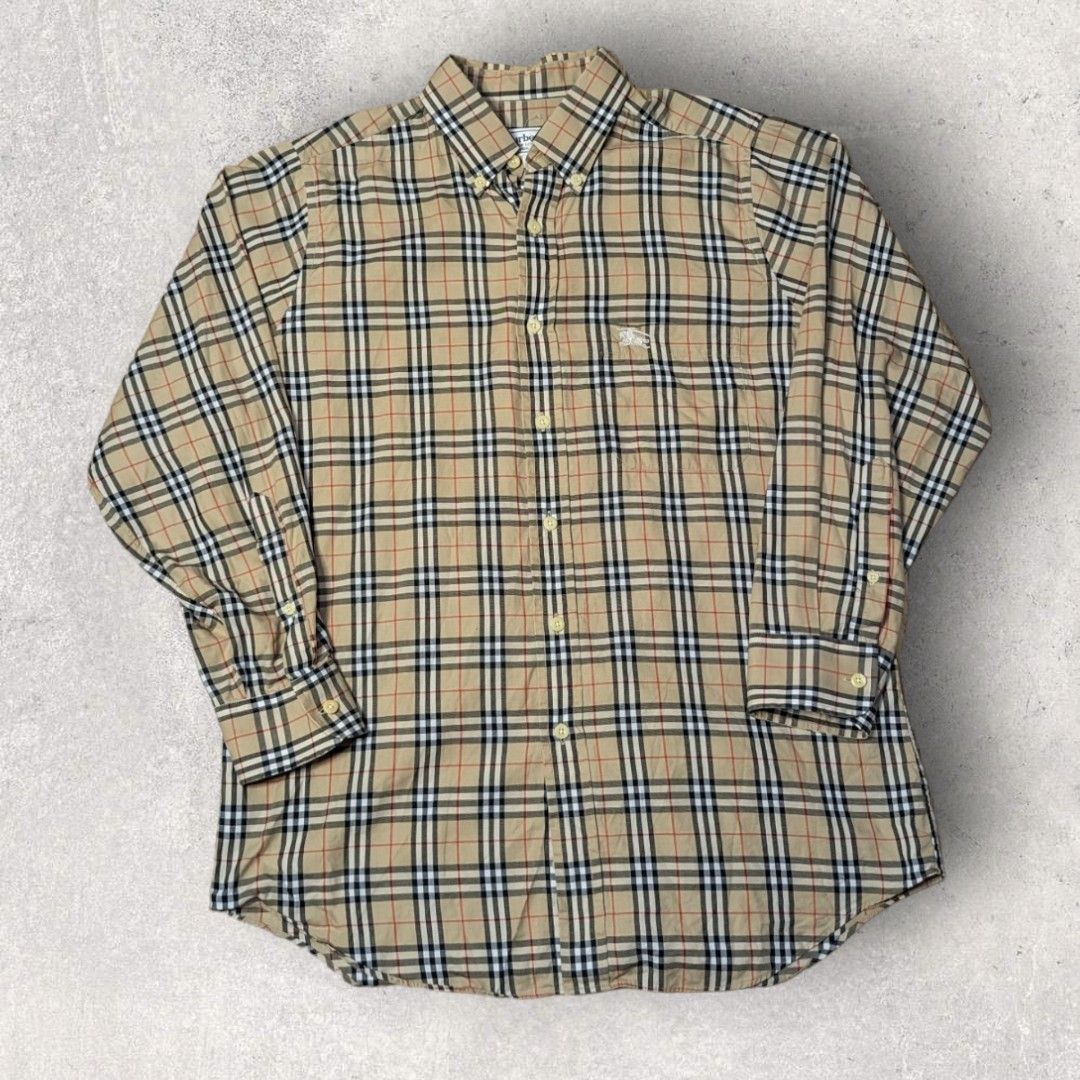 Burberry Plaid Long sleeve Polo (Category: Luxury Apparel) located in San Juan City. Submitted by 4keeps.mnl (Listing ID 1464279630, Image 1). Description: AUTHENTIC ✅ ORIGINAL Condition: 9.8/10 Large Issue: NONE.