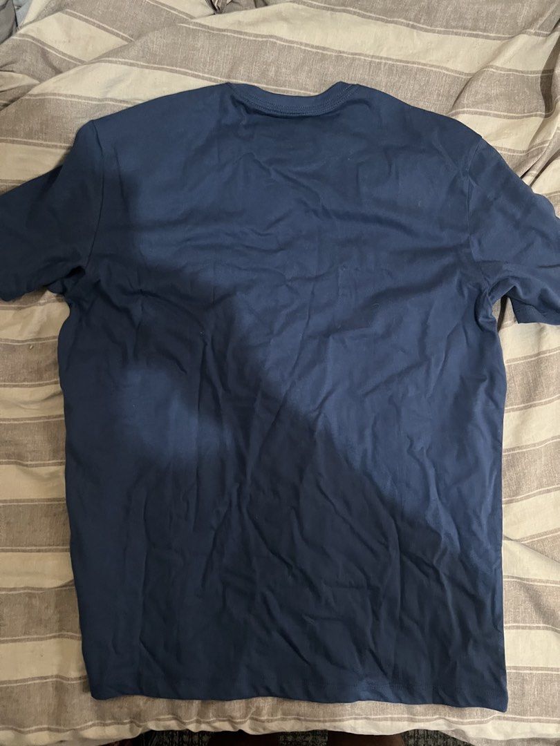 Calvin Klein crew neck shirt (Category: Shirts) located in Paranaque City. Submitted by ekkostarfall.12902 (Listing ID 1464213994, Image 2). Description: - Navy blue - Iconic CK logo graphic with repeating Calvin Klein text across the chest - Crew neck, short sleeves - Size Medium - Brand New with tag MOP: Maya, Bank transfer SF shouldered by buyer Parañaque .