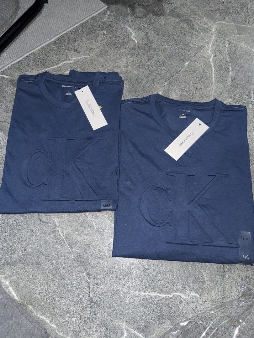 Calvin Klein Embossed Monogram Classic T-Shirt (Category: Tshirts & Polo Shirts ) located in Manila. Submitted by angelsdepot (Listing ID 1464139989, Image 2). Description: Brandnew CK in size Medium and Large 1 each only. Dimensions: M - 21x29 L - 22x29.5.