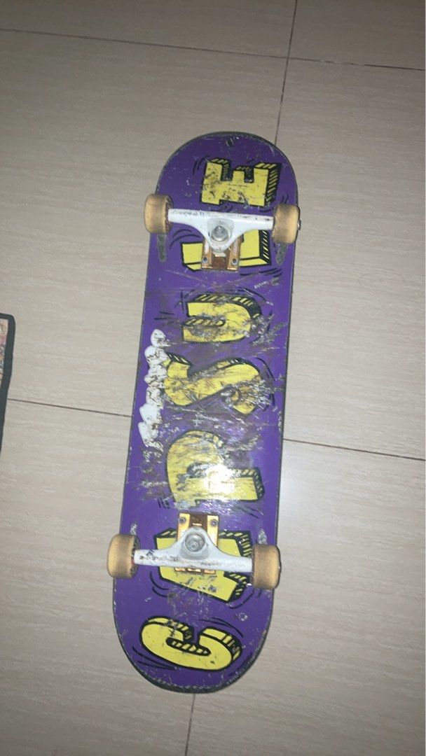 CAPSULE composi-lite Skateboard Deck and Trucks (Category: Skates, Rollerblades & Scooters) located in Manila. Submitted by joaquinalb27209 (Listing ID 1464251783, Image 1). Description: - Purple skateboard deck with yellow graphics - Thunder trucks, Shane O'Neill model - Shows scuffs and wear from use - Virtually unbreakable, resistant to chipping, cracking or delaminating. - Still rides well and is ready for a new owner -Weather proof and water