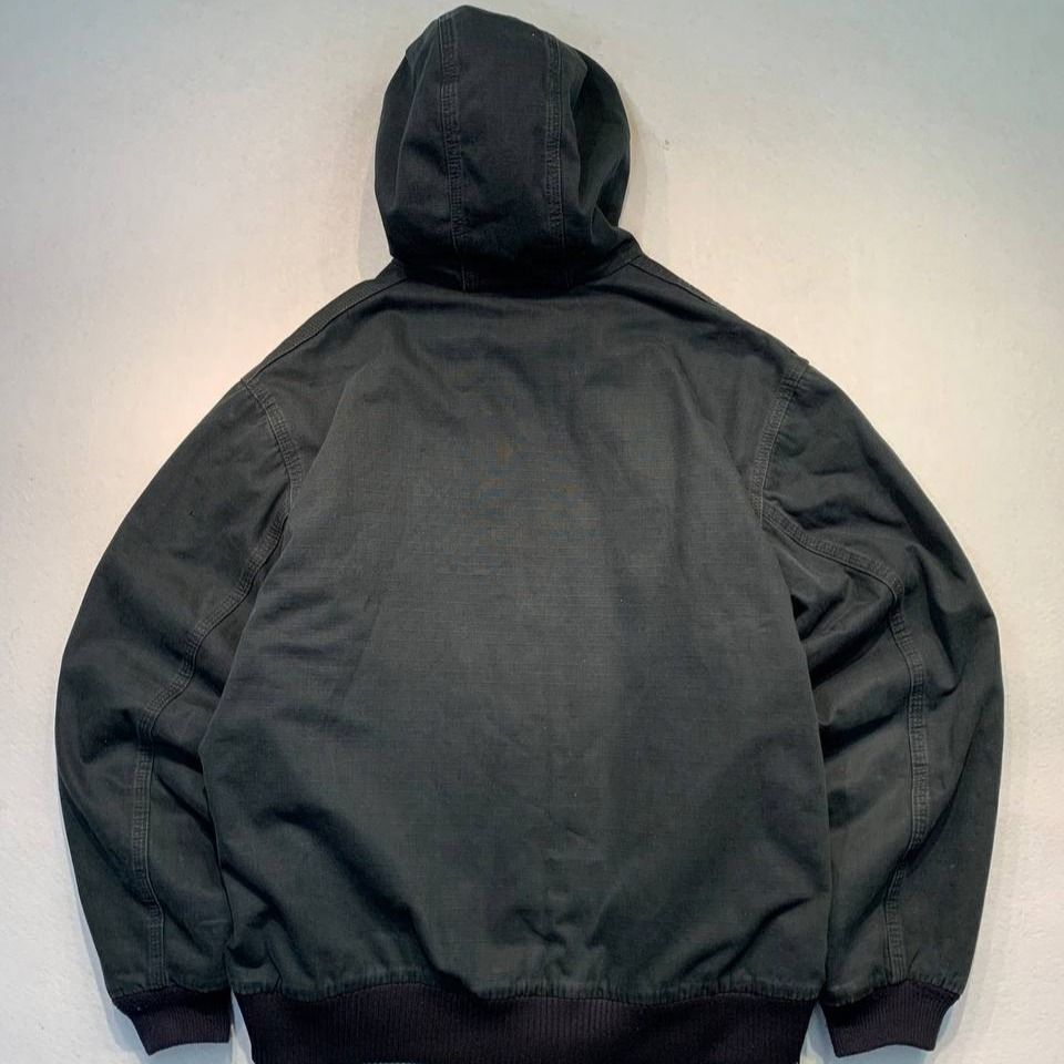 Carhartt Duck Active Jacket (Category: Coats, Jackets and Outerwear) located in Mandaluyong City. Submitted by theroom501 (Listing ID 1464324426, Image 2). Description: Carhartt Duck Active Jacket Style Code: 100108-001 (Ripstop Active Jacket) Production Date: March 2013 (0313 Tag Date) Size on Tag: Large Regular (Fits boxy/relaxed) Color: Black (Faded beautifully into a dark charcoal/graphite hue) Condition: Excellent vintage condition. Overall 