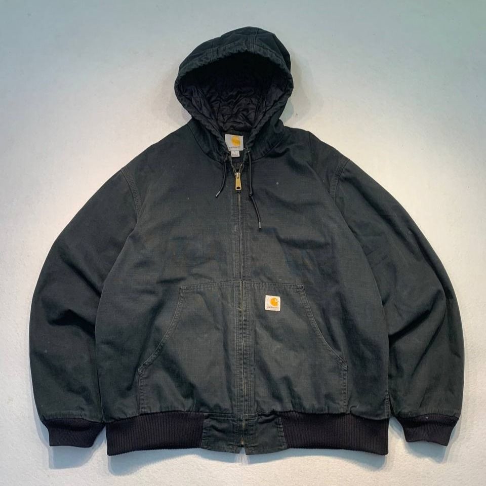 Carhartt Duck Active Jacket (Category: Coats, Jackets and Outerwear) located in Mandaluyong City. Submitted by theroom501 (Listing ID 1464324426, Image 1). Description: Carhartt Duck Active Jacket Style Code: 100108-001 (Ripstop Active Jacket) Production Date: March 2013 (0313 Tag Date) Size on Tag: Large Regular (Fits boxy/relaxed) Color: Black (Faded beautifully into a dark charcoal/graphite hue) Condition: Excellent vintage condition. Overall 