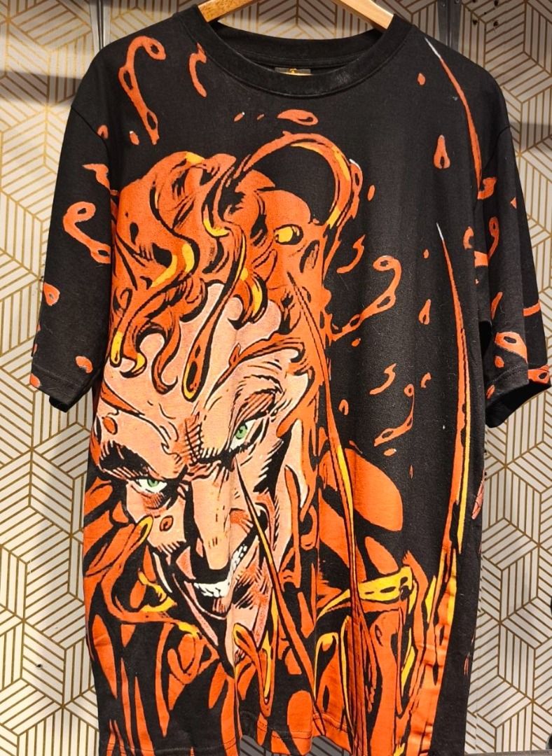 Carnage Vs Spider Man AOP (23x31) (Category: Shirts) located in Manila. Submitted by eastbluevtg (Listing ID 1464205708, Image 2). Description: - Black t-shirt with a striking, all-over print of a fiery character. - Features a vibrant, comic book-style graphic with intense details and orange/yellow flames. - Classic short sleeves and crew neck design. - Perfect for fans of graphic tees and bold, unique statement pieces. - A guaranteed head-turner