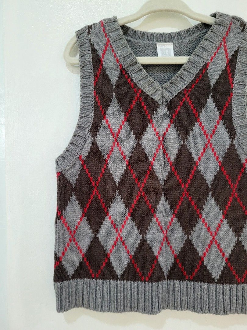 Carters Argyle Knit Vest Top (Category: Babies & Kids Fashion) located in Balanga. Submitted by marae_c (Listing ID 1464138687, Image 3). Description: Brand: Carter's In very good condition. No flaws. Very minimal sign of usage. A good layering piece for your lil boy's ootds. Slightly stretch knit. Cotton fabric. Rfs. Need closet space. ayaw na suotin ng anak ko. Decluttwring. 18 mons on tag but Fits upto 2 -3 years old petit Length: 15.5" Width: