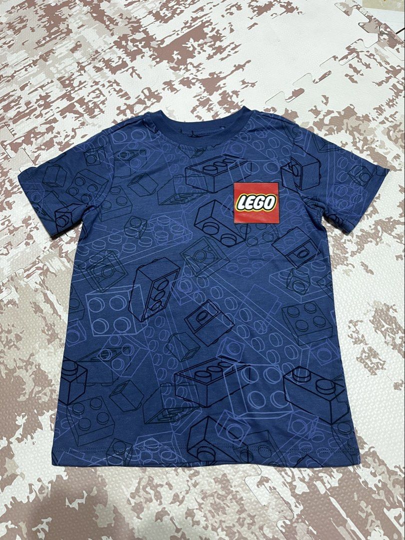 Carters Boys Lego Graphic Tee - Navy (Category: Babies & Kids Fashion) located in Quezon City. Submitted by prettydollph (Listing ID 1464309939, Image 1). Description: - Brand new without tag - Size 5, 6, 7 yrs old - Navy blue t-shirt - Fun all-over Lego brick print - Features iconic Lego logo on chest pocket area - Short sleeves - Crew neck - Ideal for any Lego fan - Comfortable and casual wear.