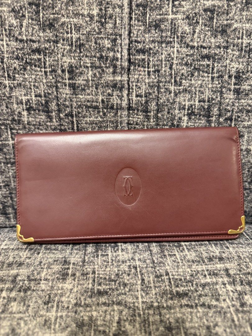 CARTIER LONG WALLET (Category: Wallets & Card holders) located in Manila. Submitted by jaylo06 (Listing ID 1464205911, Image 1). Description: Like new condition from japan bigay ng tita ko kaso i have lucky wallet eh hehe gold pa ung hardwares naka cartier sa puller and coded made in france 10 cards slot avail and may lalagayan ng coins and bills sa may gusto pm lang po thanks.