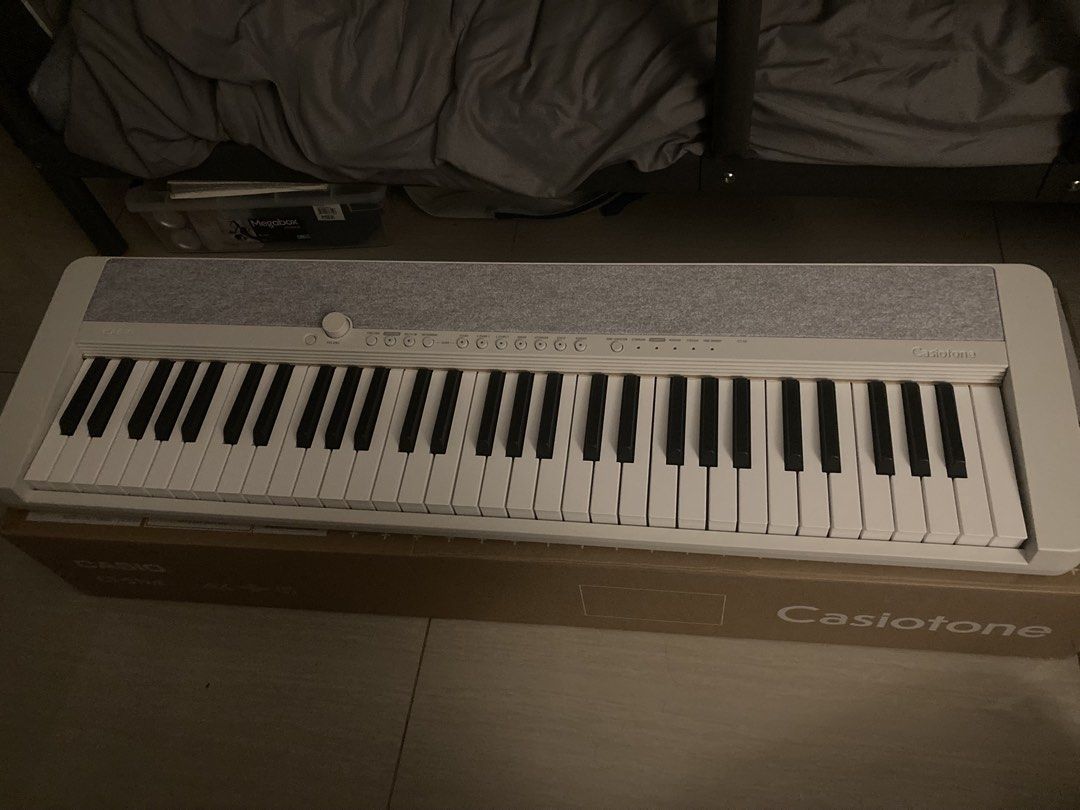Casio CT-S1 White Keyboard (Category: Musical Instruments) located in Manila. Submitted by joaquinalb27209 (Listing ID 1464173617, Image 1). Description: - Casio CT-S1 Casiotone - 61 keys - Stylish grey fabric top - Comes with original box and packaging - Ideal for beginners and practice sessions - Feel free to ask questions!.
