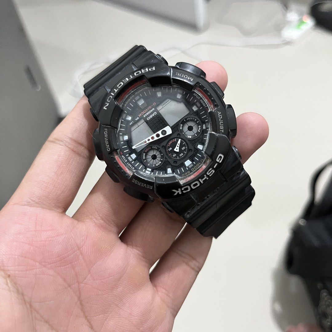 Casio G-Shock Watch (Category: Men's Watches) located in San Fernando. Submitted by cyrelregal27910 (Listing ID 1464246722, Image 1). Description: - Black G-Shock watch - Digital and analog display - Multiple sub-dials for stopwatch functions - Water resistant - Black band with red accents on watch face - Shows some signs of wear on strap and casing - Selling as is -Palagyan nyo nalang battery working yan busy na sa work. .