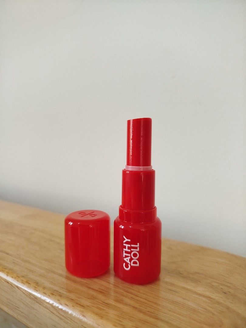 Cathy Doll Sold Out Hya Balm in 06 Candy (Category: Makeup) located in Quezon City. Submitted by luckycitrine (Listing ID 1464214501, Image 2). Description: - Usage shown, barely used - Top layer sliced off for hygiene purposes - EXP 20281013 - Ships via Grab/Lalamove from Novaliches.