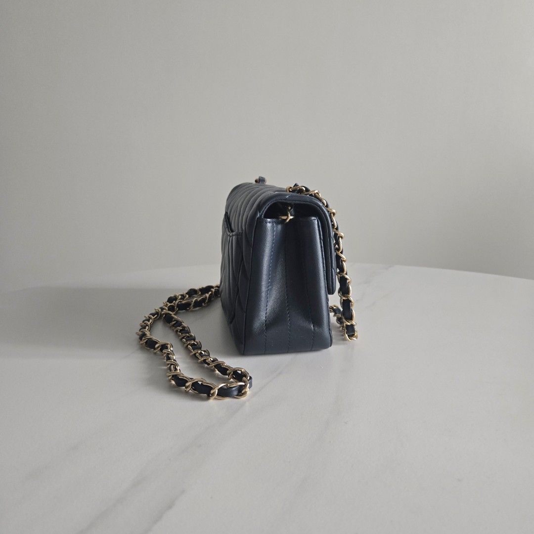 Cc Mini Flap (Category: Luxury Bags & Wallets) located in Paranaque City. Submitted by dclutterqueen (Listing ID 1464162044, Image 3). Description: Chanel Square Mini Flap in Navy Blue color 💯 Genuine Leather - Lambskin in Chevron quilted pattern 🇯🇵 Acquired preloved from Japan 👜 Measures approximately 6.5 x 5 inches.