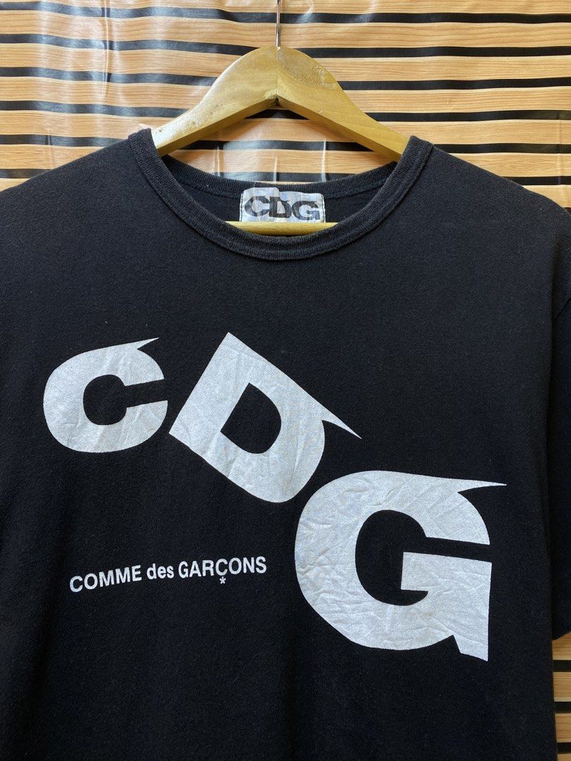 CDG Comme des Garçons logo Tee (Category: Tshirts & Polo Shirts ) located in Makati City. Submitted by drip.poww (Listing ID 1464234779, Image 3). Description: - Authentic Comme Des garcons - Color: Black - Size: Meduim - Dimes: 21x27 - Authentic - Excellent condition - Need wash, fresh from bale - Material: 100% Cotton Please don’t expect too much—these are thrifted (ukay) items. 😉.
