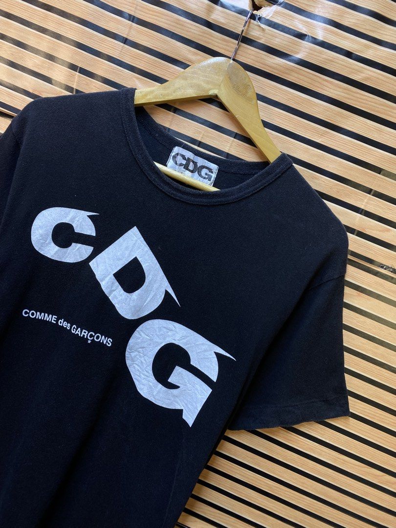 CDG Comme des Garçons logo Tee (Category: Tshirts & Polo Shirts ) located in Makati City. Submitted by drip.poww (Listing ID 1464234779, Image 2). Description: - Authentic Comme Des garcons - Color: Black - Size: Meduim - Dimes: 21x27 - Authentic - Excellent condition - Need wash, fresh from bale - Material: 100% Cotton Please don’t expect too much—these are thrifted (ukay) items. 😉.