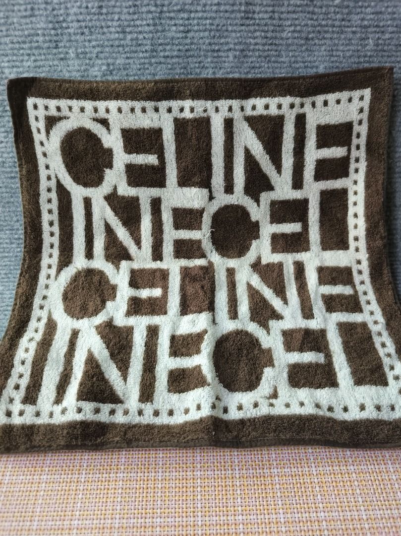 Celine Brown White Logo Towel (Category: Bedding & Towels) located in San Leonardo. Submitted by burgossanleonardo.12345 (Listing ID 1464181089, Image 1). Description: - Authentic Celine towel - Features iconic brown and white Celine logo pattern - Made from soft cotton material - Ideal for everyday use or as a collectible - Approximate dimensions: [insert size if known] - A great addition to your Celine collection.
