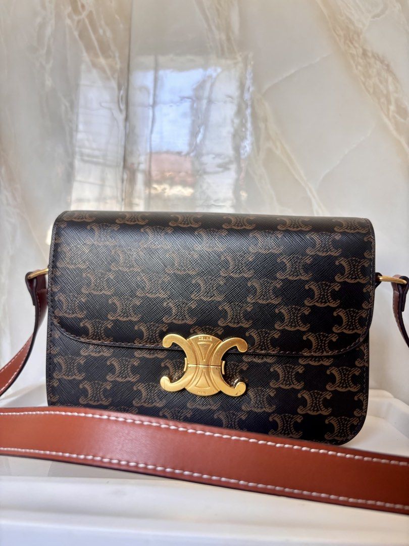 Celine Triomphe Canvas Shoulder Bag Brown (Category: Luxury Bags & Wallets) located in Caloocan City. Submitted by lovelj_2026 (Listing ID 1464251345, Image 1). Description: Preloved japan bag Still in good condition Minimal sign of usage Please manage your expectaions - Authentic Celine shoulder bag - Iconic Triomphe canvas in brown and tan - Signature gold-tone Triomphe clasp - Adjustable leather shoulder strap - Versatile for everyday or speci