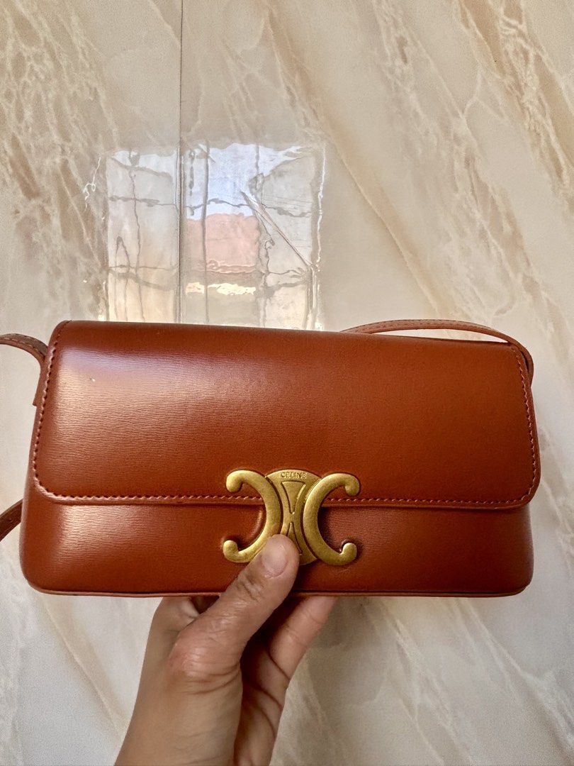 Celine Triomphe Shoulder Bag in Brown Leather (Category: Luxury Bags & Wallets) located in Caloocan City. Submitted by lovelj_2026 (Listing ID 1464251096, Image 1). Description: Japan preloved bags Still in good condition Minimal sign of usage Please manage your expectations. - brown leather Celine shoulder bag - Iconic gold-tone Triomphe clasp - Interior slip pocket for essentials - Adjustable strap for comfortable wear - Timeless and versatile 