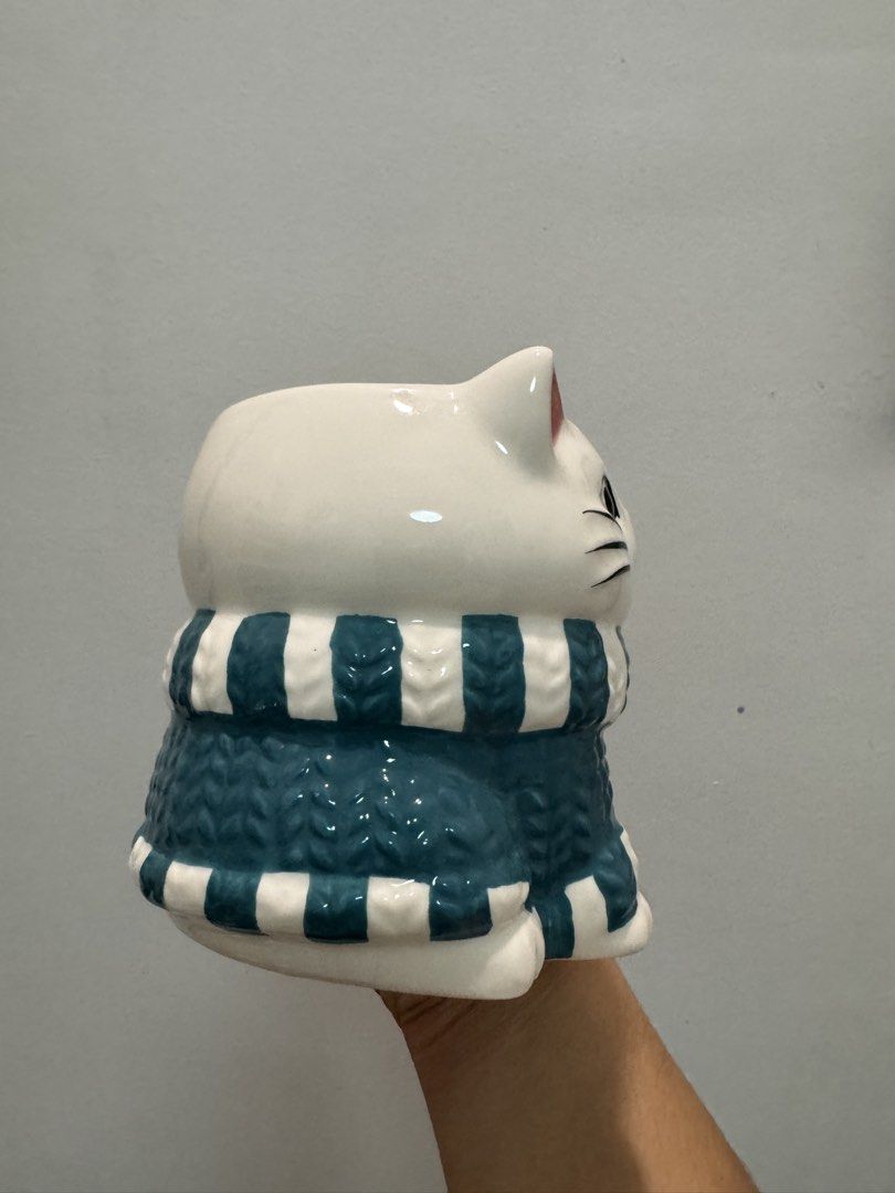 Ceramic Cute Winter Cat Mug (Category: Coffee & Tea Tableware) located in Quezon City. Submitted by fragilebabies (Listing ID 1464234379, Image 2). Description: Disclaimer: Please be reminded that these mugs are mall pull-out items. Minor imperfections such as small chips, slight paint chips, crazing (fine hairlines), and other minor marks may be present and are considered normal for mall pull-out items. That said, most of our mugs are still in g