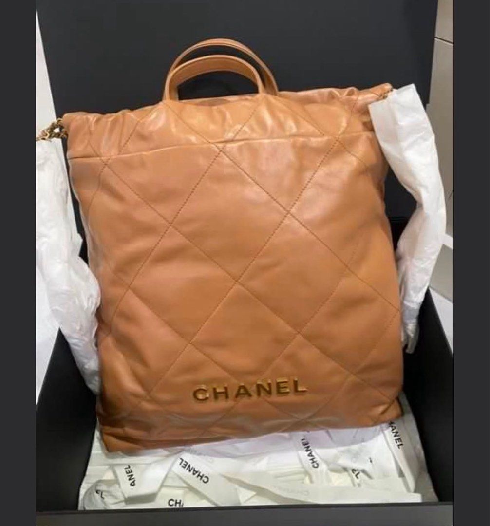 Chanel 22 backpack (Category: Luxury Bags & Wallets) located in Pasig City. Submitted by myraindrop (Listing ID 1464251442, Image 3). Description: Authentic. Almost new. Store bought. Chanel boutique at HK airport. Microchip.comes in full set. With box, dust card, care card and receipt. Color Camel..