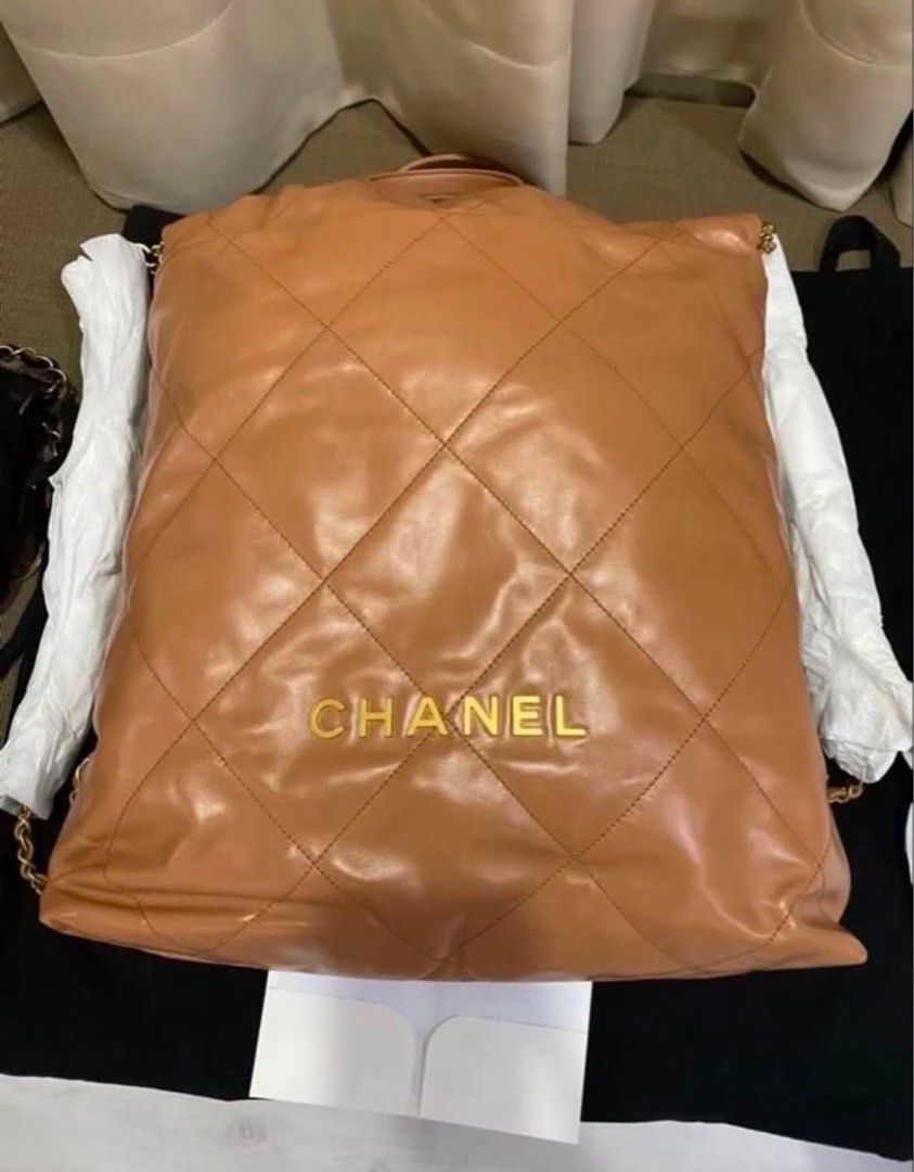 Chanel 22 backpack (Category: Luxury Bags & Wallets) located in Pasig City. Submitted by myraindrop (Listing ID 1464251442, Image 2). Description: Authentic. Almost new. Store bought. Chanel boutique at HK airport. Microchip.comes in full set. With box, dust card, care card and receipt. Color Camel..